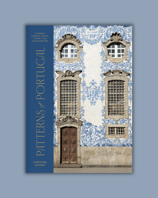Patterns of Portugal book cover showing an ornate blue-and-white tiled building facade beside a dark blue title panel.